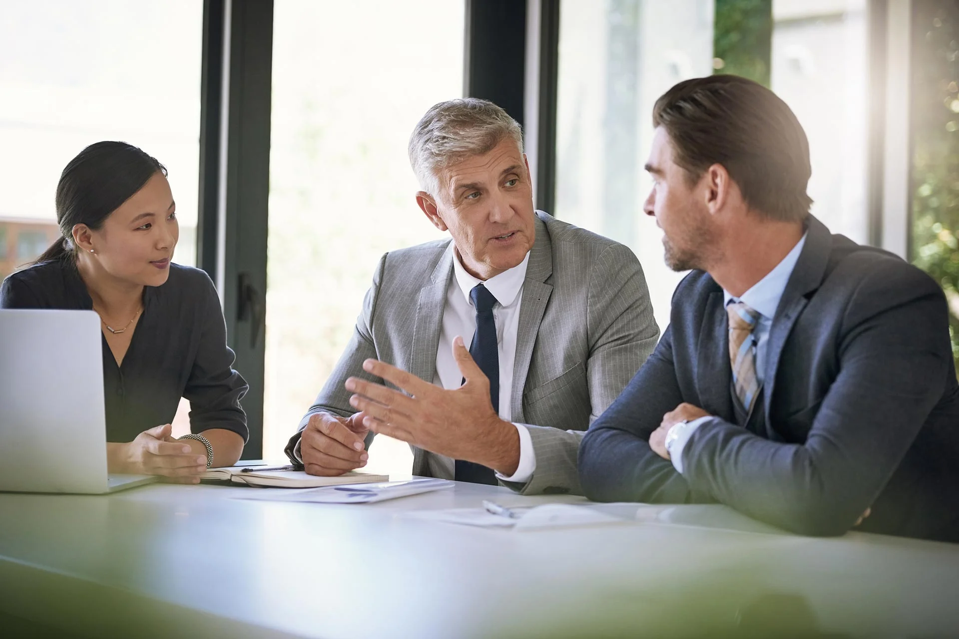 businessmen-discussing-mortgage-and-insurance-advice.webp businessmen discussing mortgage and insurance advice