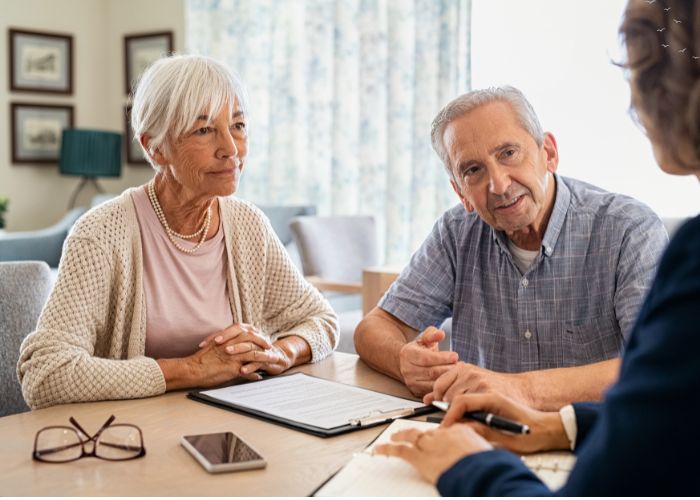 elderly couple asking reverse mortgage questions